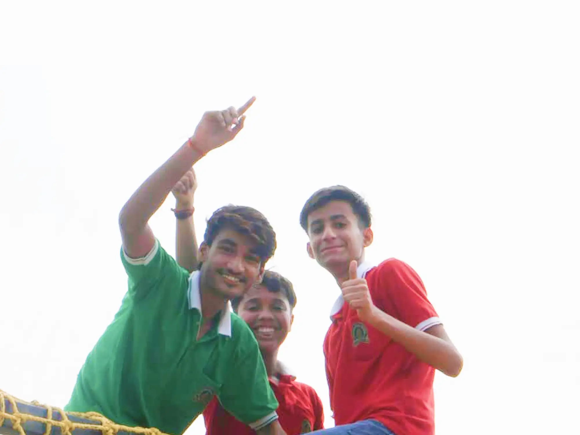 School friends posing happily during their visit