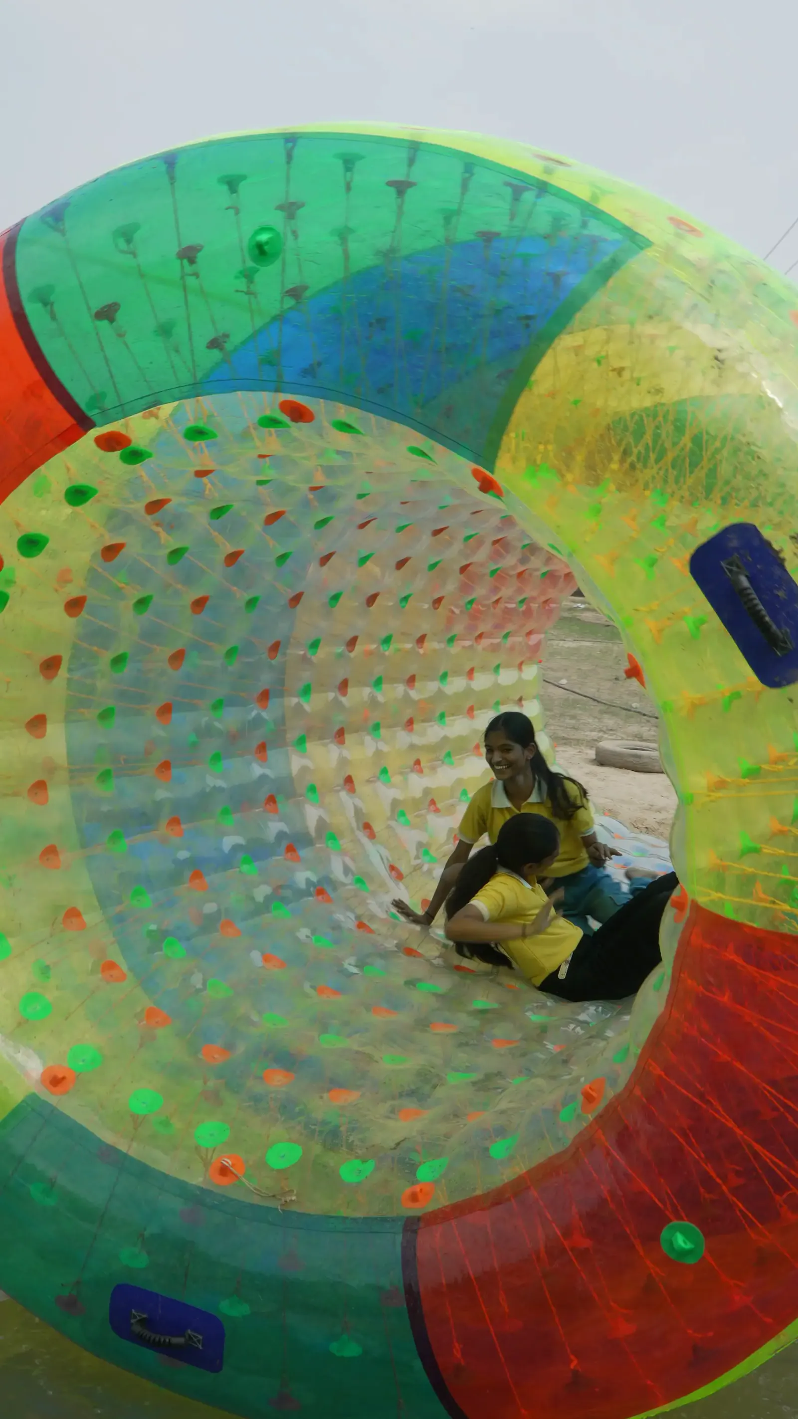Indian students enjoying zorb games at Veda Adventures Park