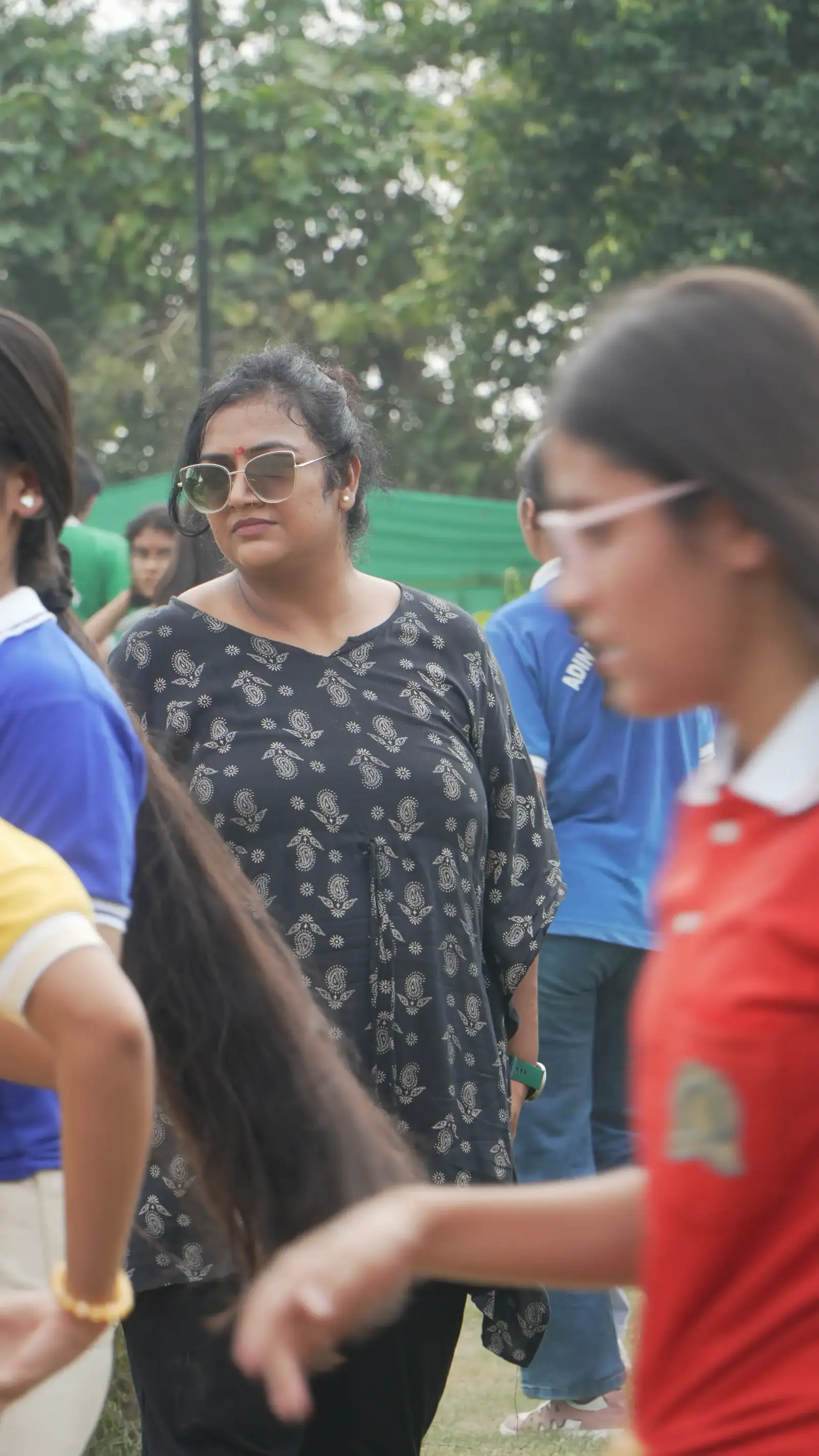 Office team playing group games during an outing in Noida