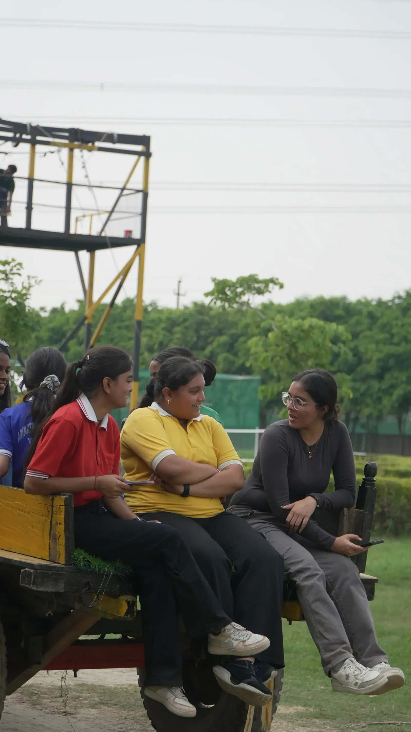 Indian friends reconnecting during a day out at Veda Adventures Park