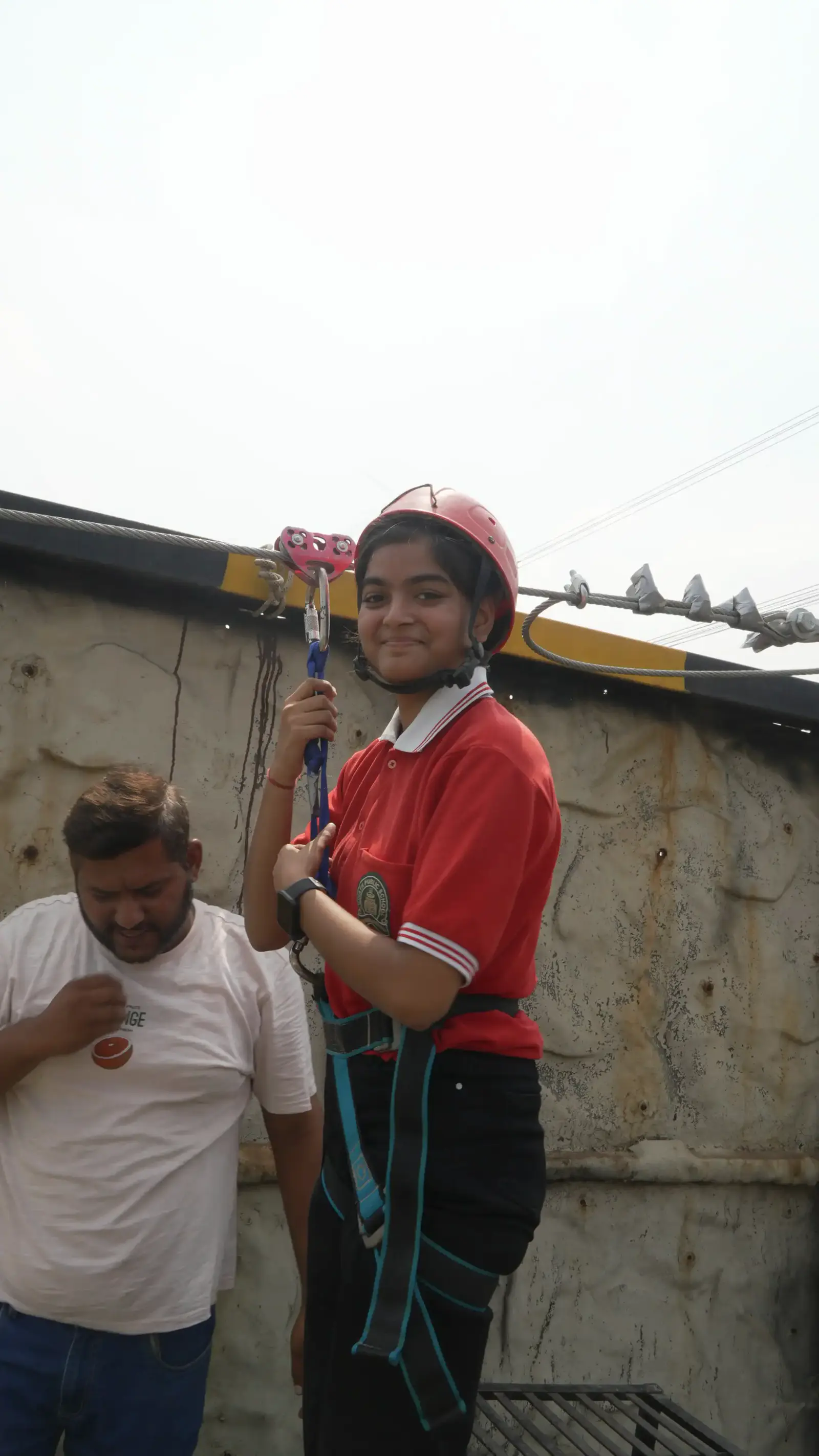 Colleagues taking on the zipline during a corporate outing in Noida