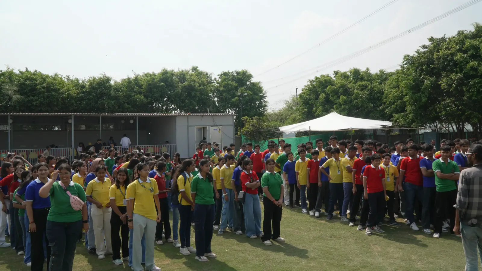 Students gathered for the welcome briefing at the start of the picnic