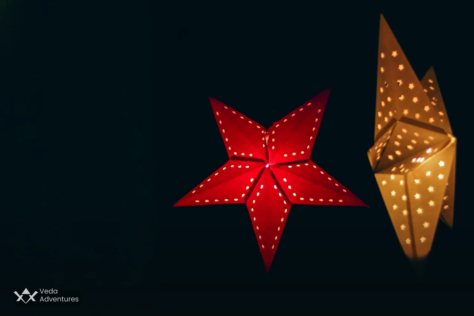 Red and gold illuminated paper stars for Christmas and New Year
